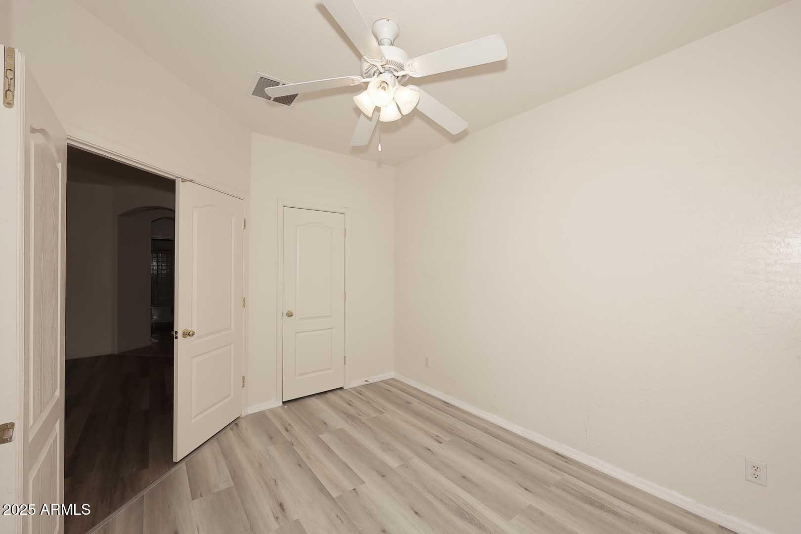2710 East Chester Drive Chandler, AZ 85286 - Photo 20 of 28 wooden floor in an empty room