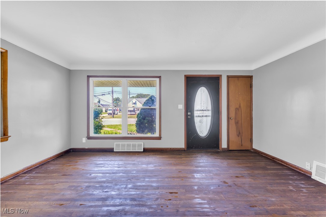 5817 Turney Road Garfield Heights, OH 44125 - Photo 5 of 31 Foyer entrance featuring wood finished floors and baseboards