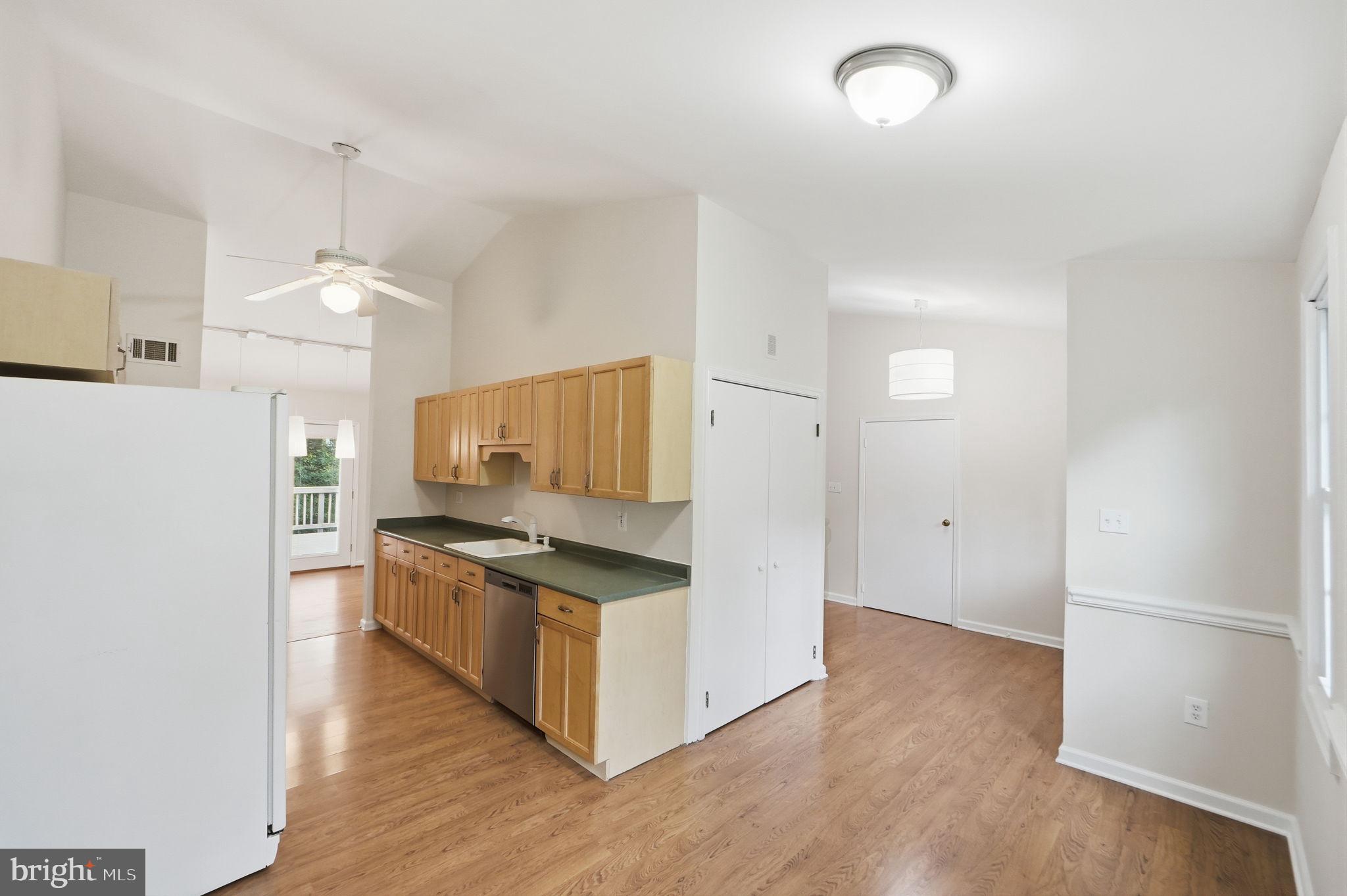 14204 Piccadilly Road Silver Spring, MD 20906 - Photo 7 of 42 Kitchen Open to Breakfast Nook and Foyer