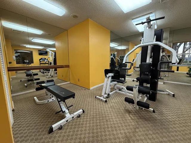 a view of a room with gym equipment