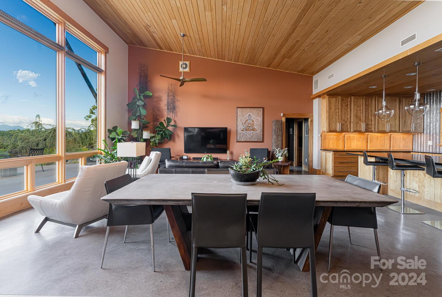 265 Alexander Road Alexander, NC 28701 - Photo 11 of 48 a view of a dining room with furniture window and outside view