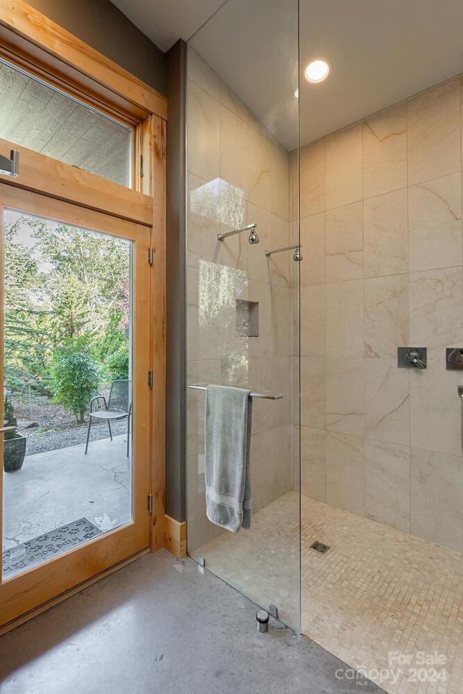 265 Alexander Road Alexander, NC 28701 - Photo 17 of 48 a bathroom with a shower