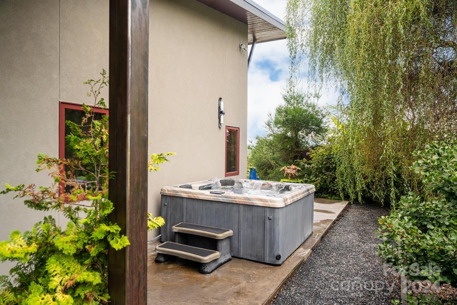 265 Alexander Road Alexander, NC 28701 - Photo 18 of 48 a bathroom with a sink and mirror