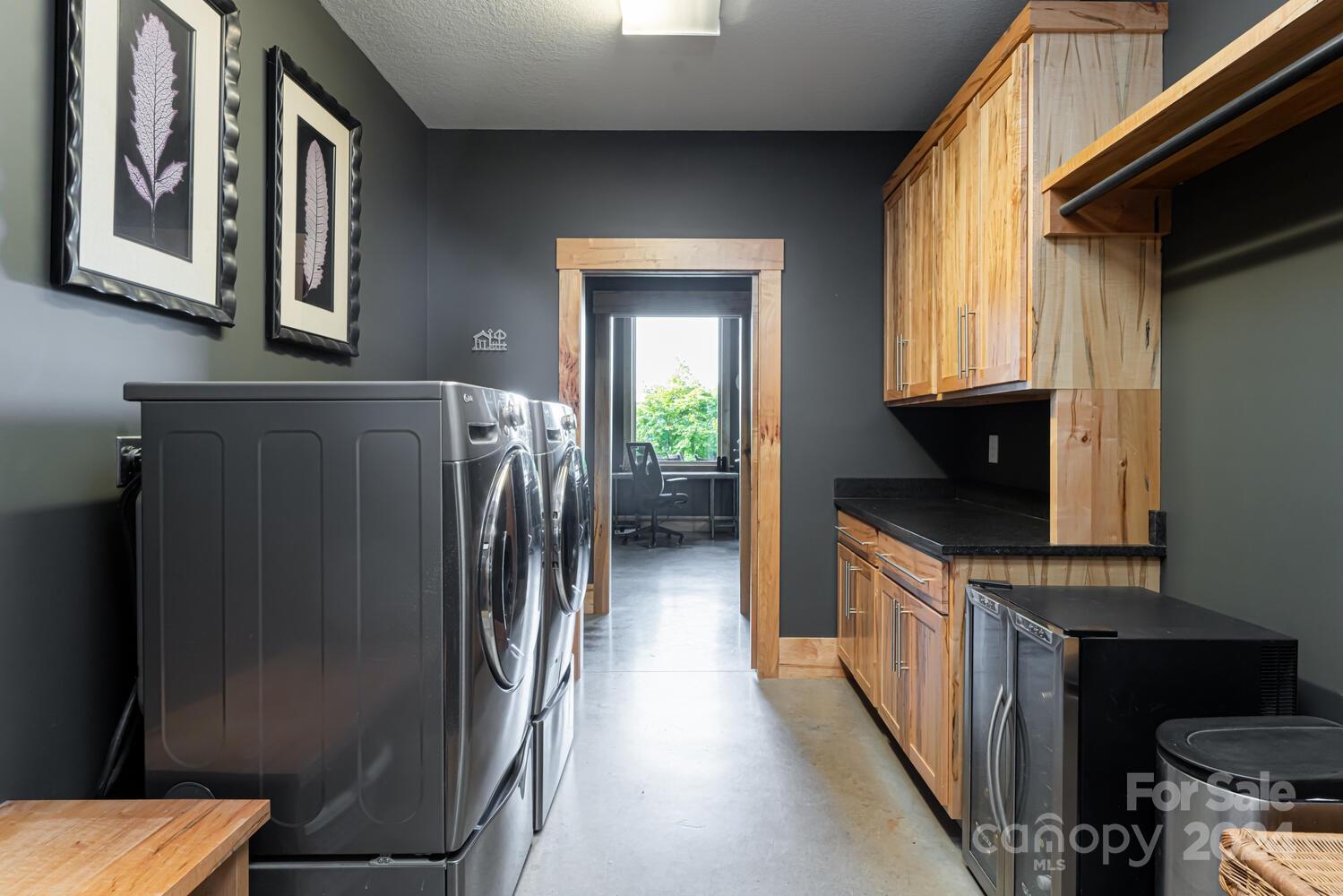 265 Alexander Road Alexander, NC 28701 - Photo 26 of 48 a hallway with washer and dryer