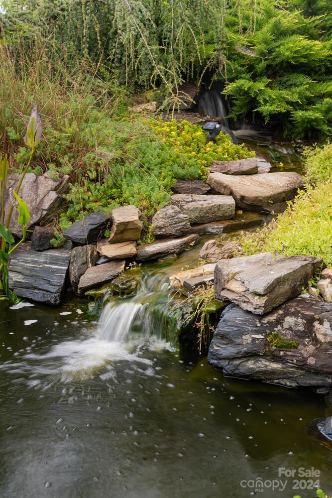 265 Alexander Road Alexander, NC 28701 - Photo 35 of 48 a view of swimming pool with a yard