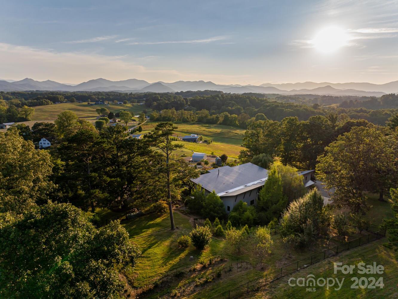 265 Alexander Road Alexander, NC 28701 - Photo 45 of 48 a view of a lake with a mountain