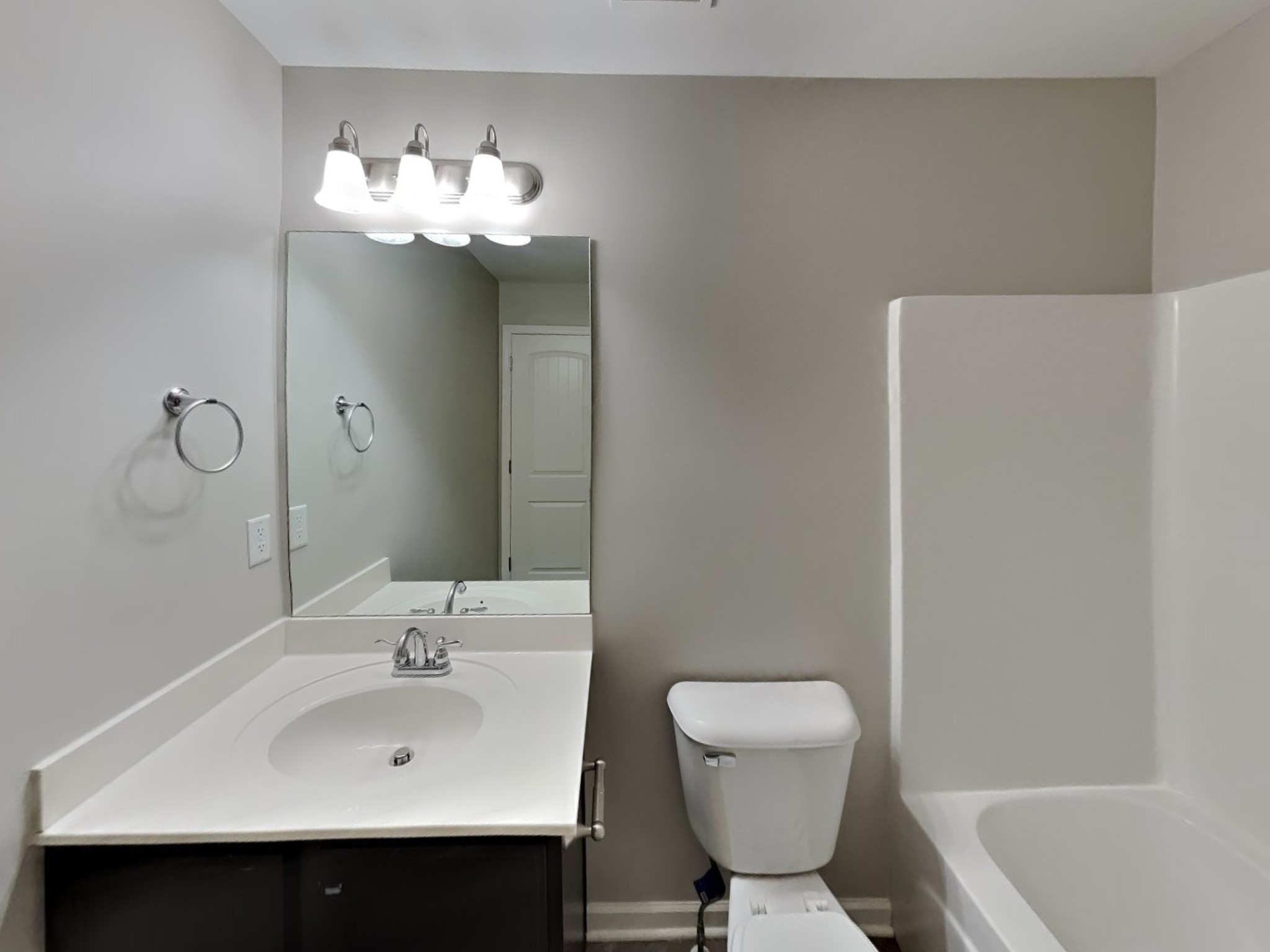 1093 Neeleys Bend East Spring Hill, TN 37174 - Photo 13 of 16 a bathroom with a sink a toilet and bathtub