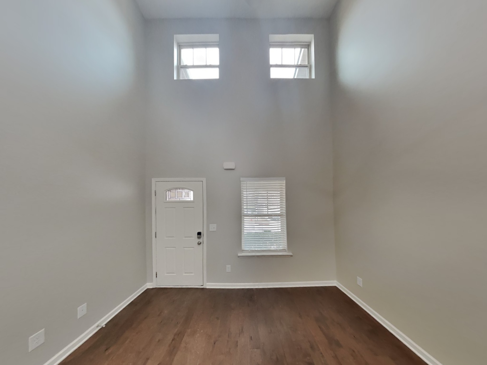 1093 Neeleys Bend East Spring Hill, TN 37174 - Photo 3 of 16 an empty room with wooden floor and windows