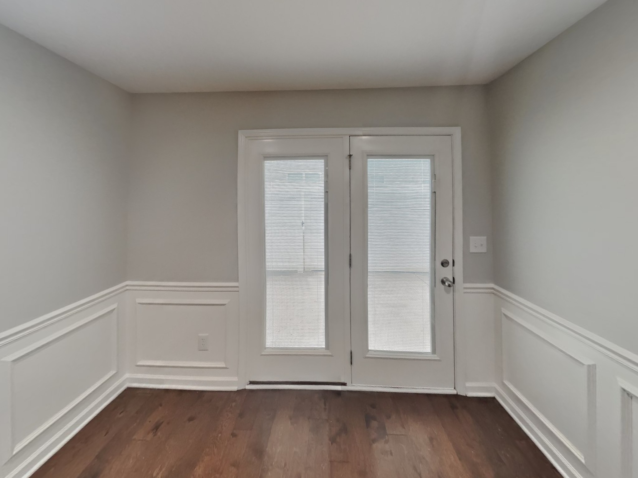 1093 Neeleys Bend East Spring Hill, TN 37174 - Photo 4 of 16 a view of an empty room with wooden floor and a window