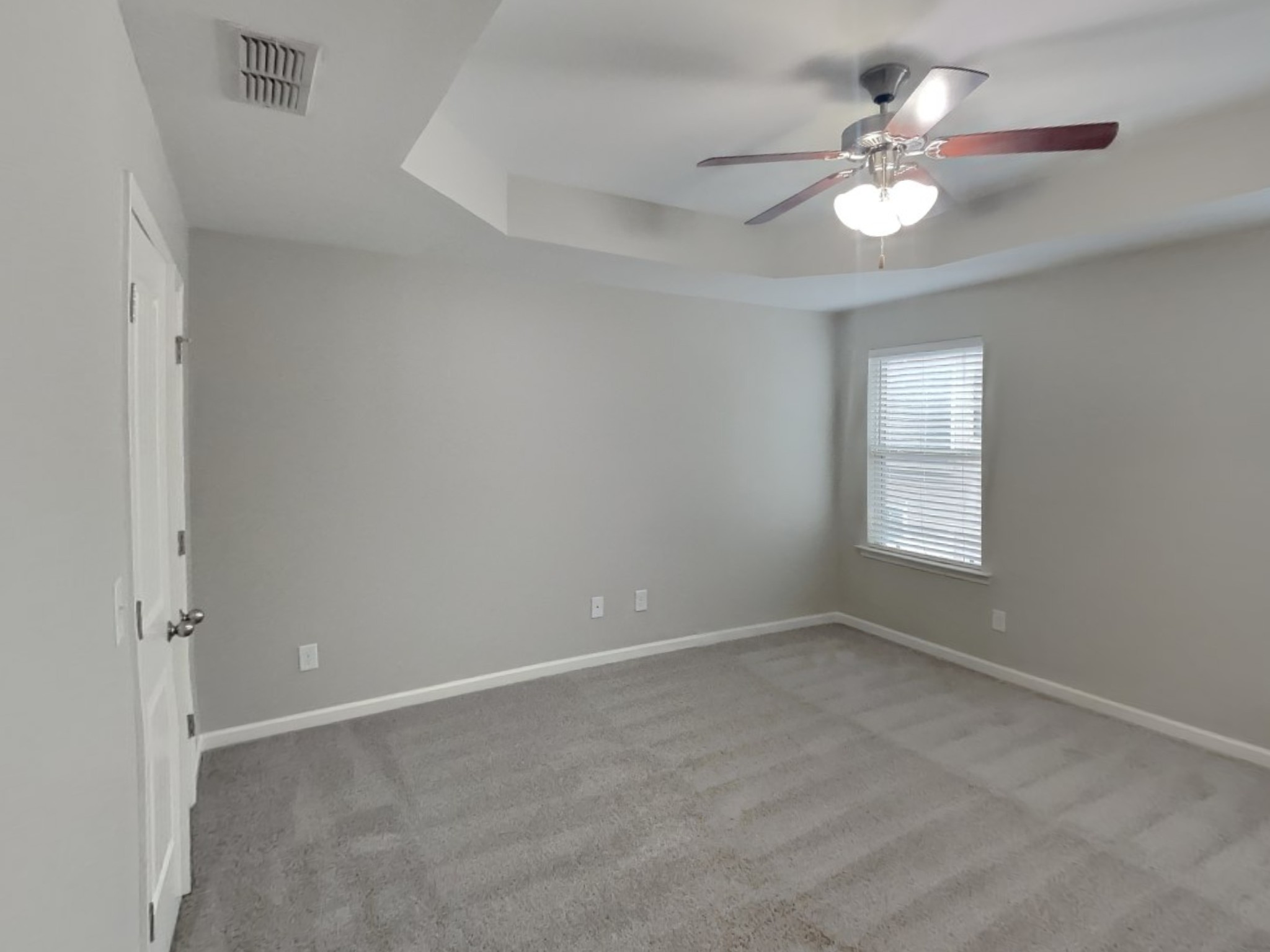 1093 Neeleys Bend East Spring Hill, TN 37174 - Photo 7 of 16 an empty room with a chandelier fan and windows
