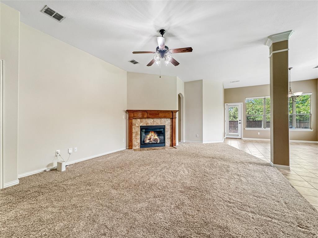 401 Varnum Way Fairview, TX 75069 - Photo 33 of 33 a view of an empty room with a fireplace and a window