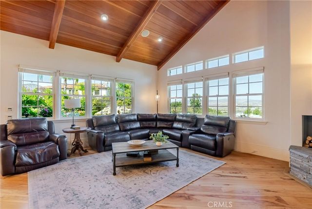 a bathroom with a sink a mirror and a window