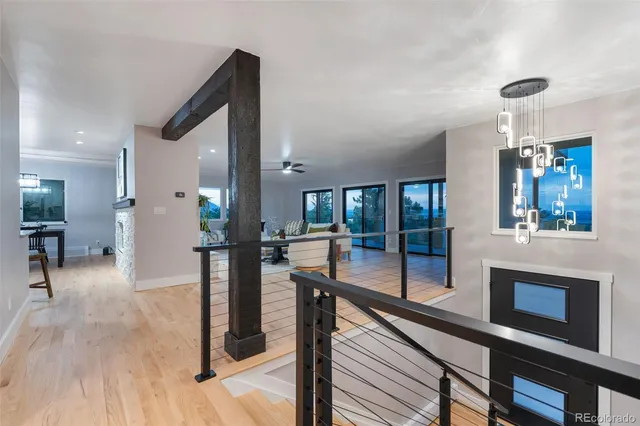 a view of a living room and a balcony