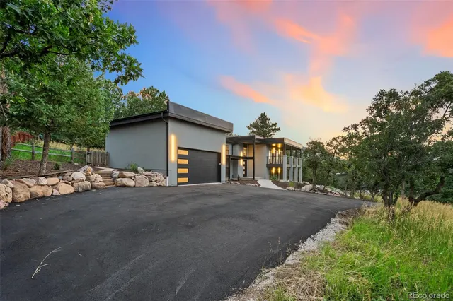 a view of a house with a street