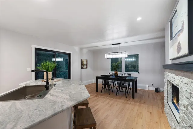 a view of a dining room with furniture and window