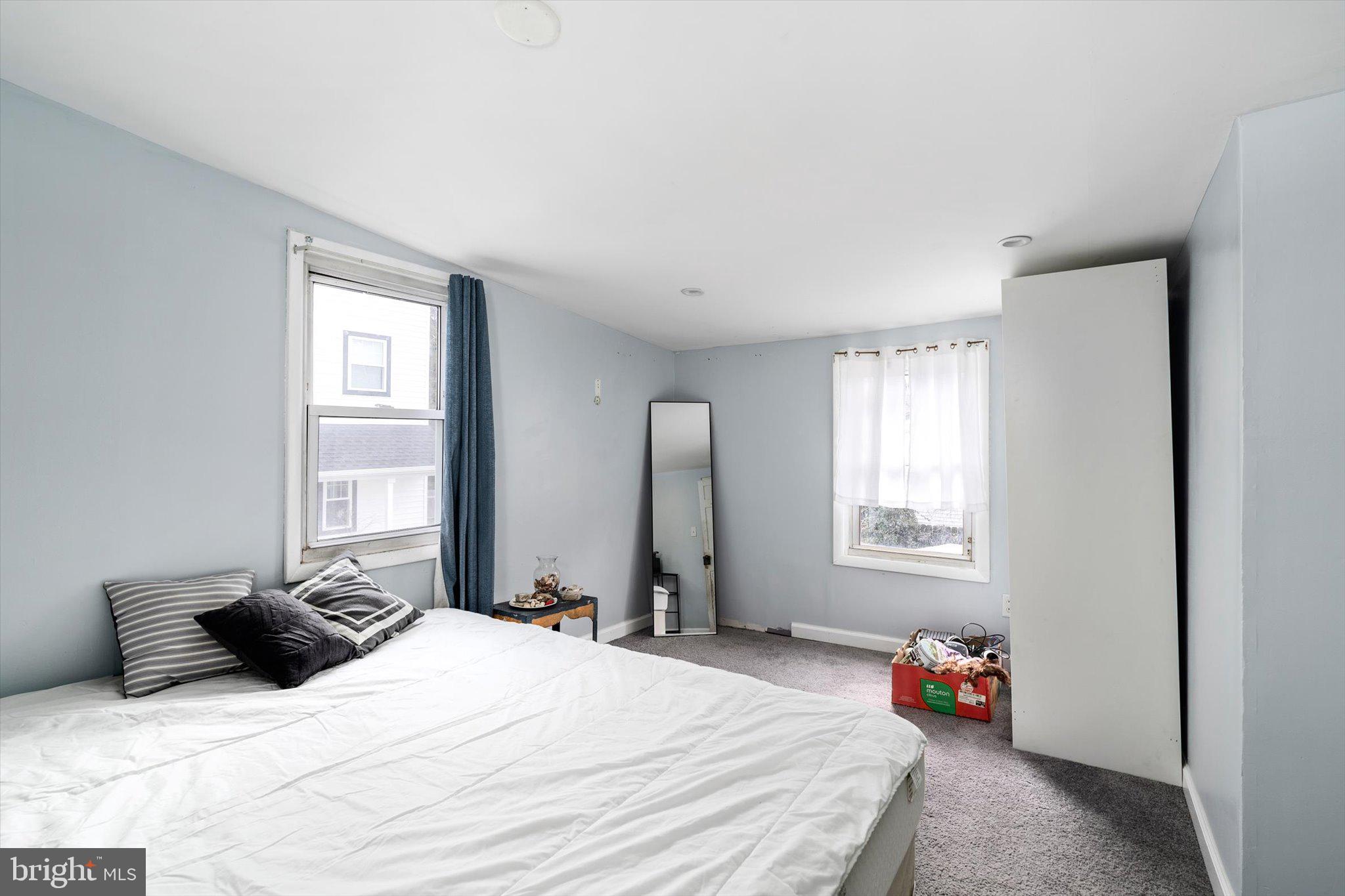22 Brainerd Street Mount Holly, NJ 08060 - Photo 11 of 20 a bedroom with a bed and a window