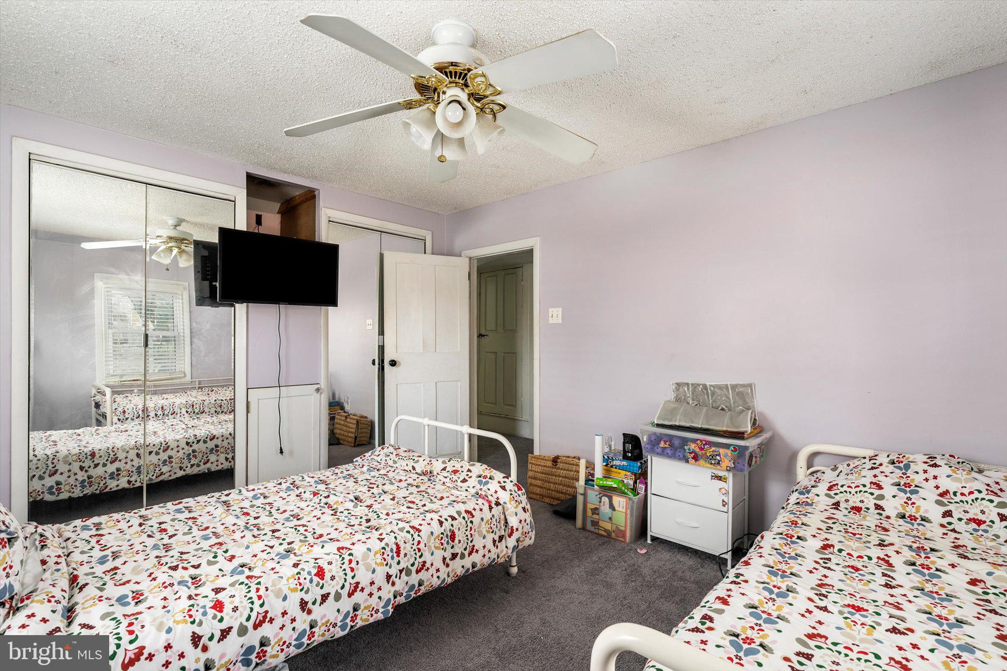 22 Brainerd Street Mount Holly, NJ 08060 - Photo 13 of 20 a bedroom with bed and a window