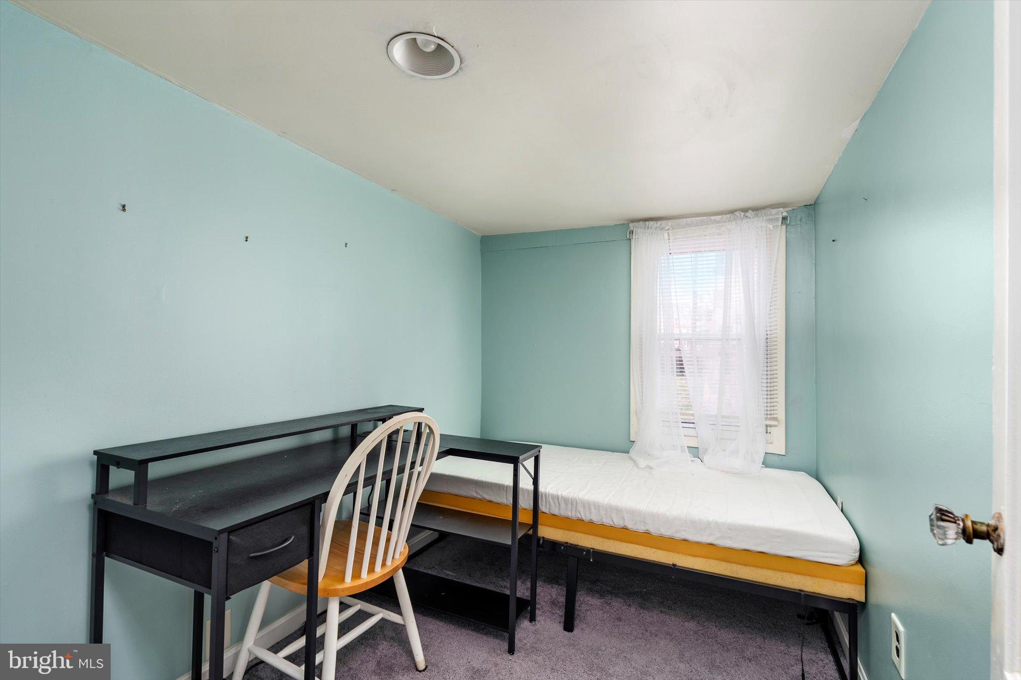 22 Brainerd Street Mount Holly, NJ 08060 - Photo 14 of 20 a bedroom with a bed and a dresser