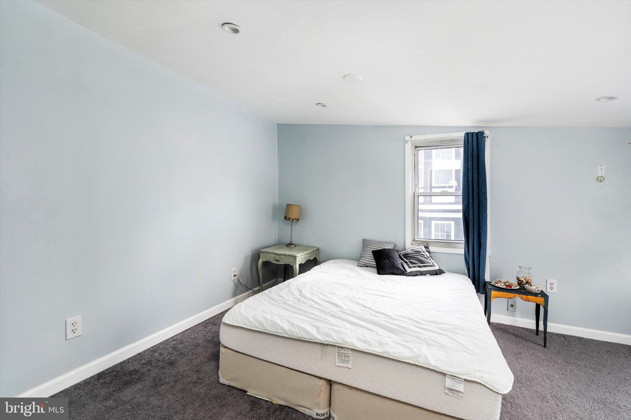 22 Brainerd Street Mount Holly, NJ 08060 - Photo 10 of 20 a bedroom with a bed and window