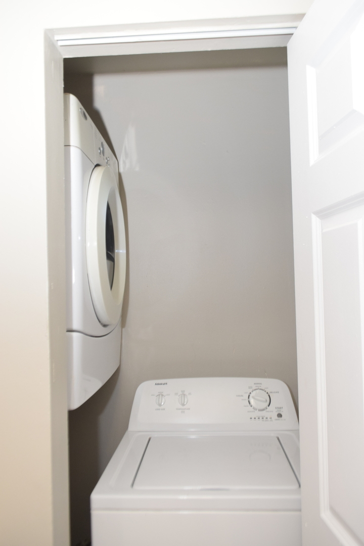 1959 North Hicks Road, Unit 103 Palatine, IL 60074 - Photo 14 of 22 a utility room with dryer and washer