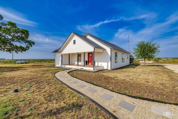 a view of house with outdoor space