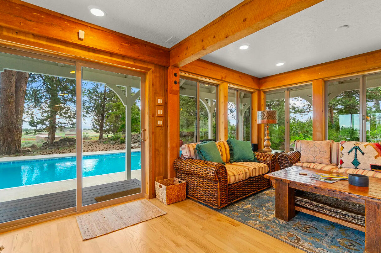 60359 Arnold Market Road Bend, OR 97702 - Photo 26 of 64 ponderosa pines, lava rock berms and natural vegetation create privacy around the pool