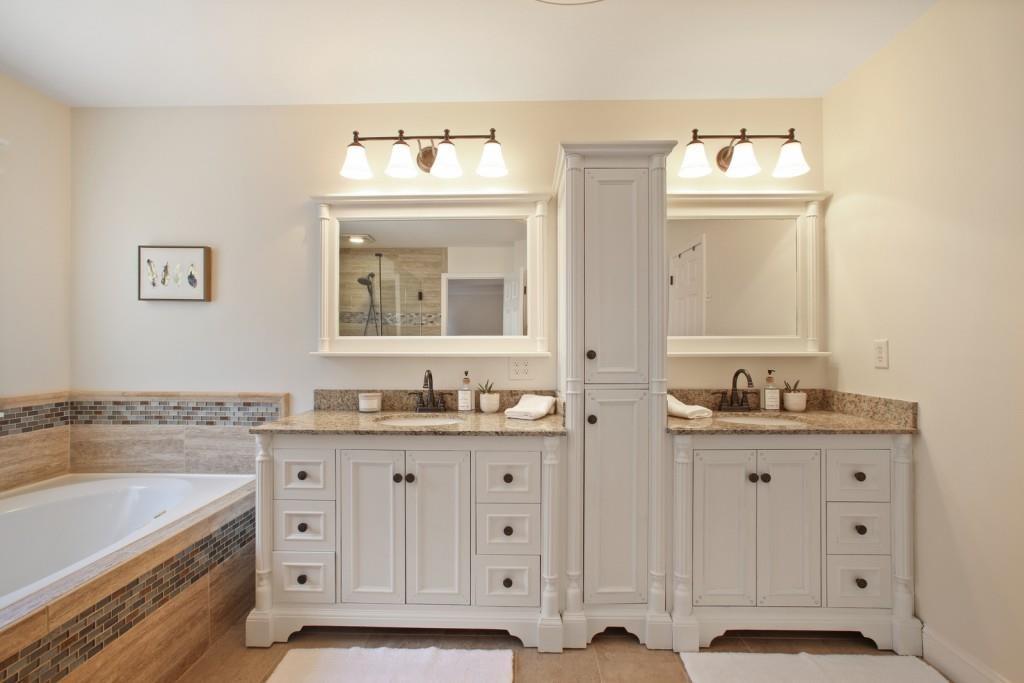 3761 Falls Trail Winston, GA 30187 - Photo 18 of 45 a bathroom with a sink vanity granite tub and a mirror