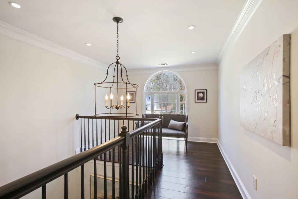 3761 Falls Trail Winston, GA 30187 - Photo 24 of 45 a view of a room with wooden floor windows and a chandelier