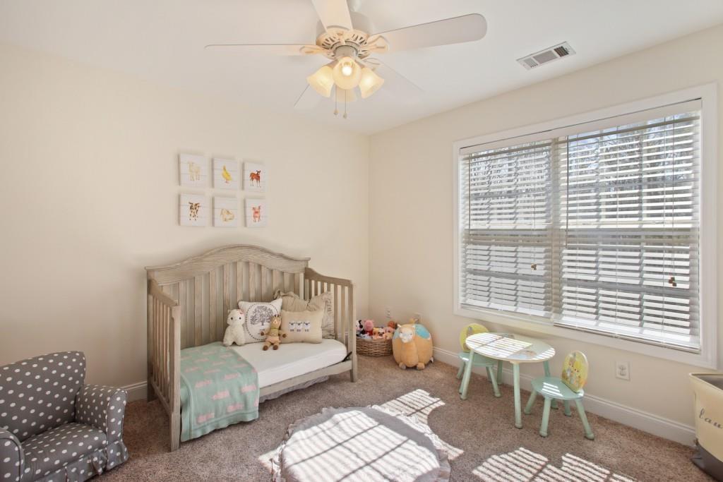 3761 Falls Trail Winston, GA 30187 - Photo 26 of 45 a bedroom with furniture and a large window