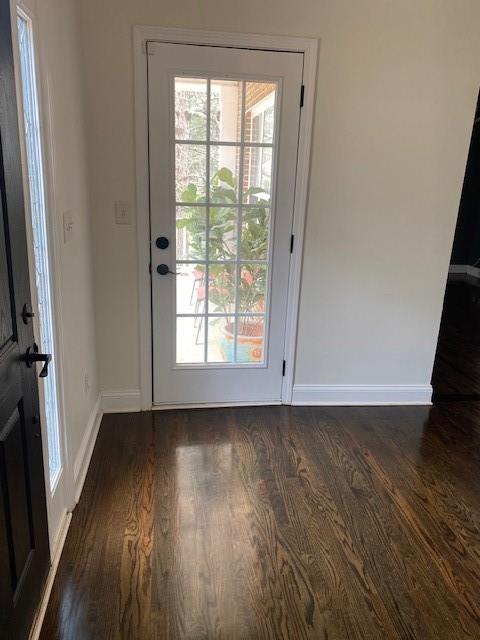 3761 Falls Trail Winston, GA 30187 - Photo 3 of 45 a view of an empty room with wooden floor and a window