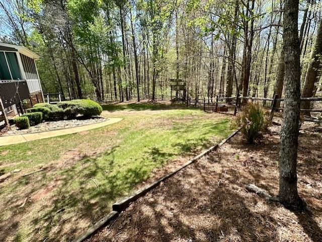 3761 Falls Trail Winston, GA 30187 - Photo 39 of 45 a view of backyard with patio