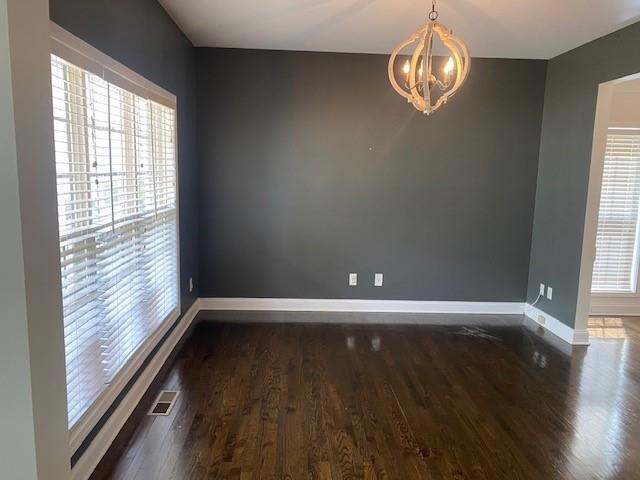 3761 Falls Trail Winston, GA 30187 - Photo 5 of 45 a view of an empty room with wooden floor and a window