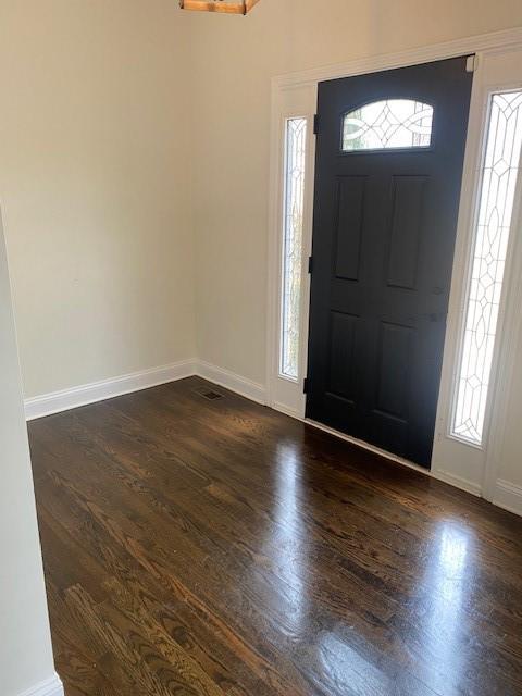 3761 Falls Trail Winston, GA 30187 - Photo 7 of 45 an empty room with wooden floor and windows