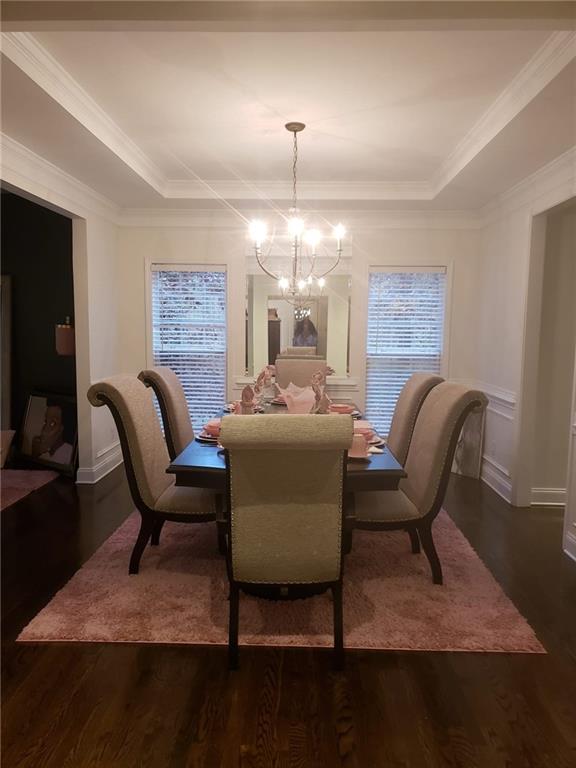3761 Falls Trail Winston, GA 30187 - Photo 9 of 45 a living room with furniture and a chandelier