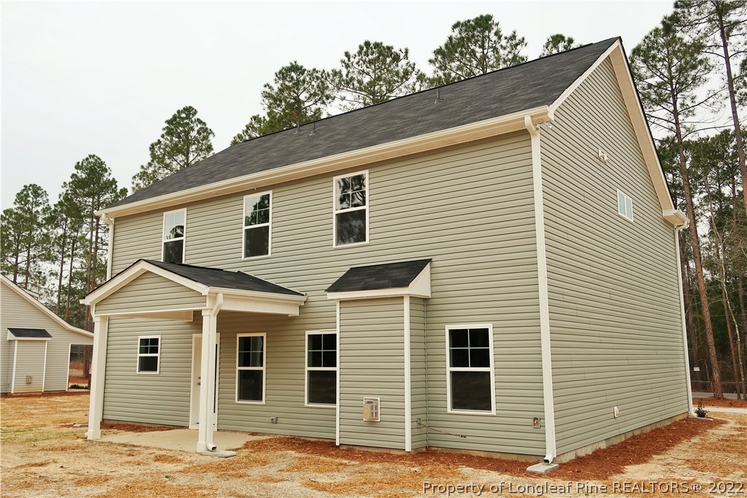 927 Montrose Road Raeford, NC 28376 - Photo 16 of 17 a view of a house with a yard