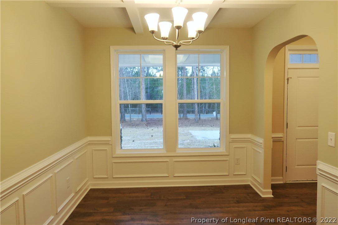 927 Montrose Road Raeford, NC 28376 - Photo 4 of 17 a view of a room with wooden floor and windows