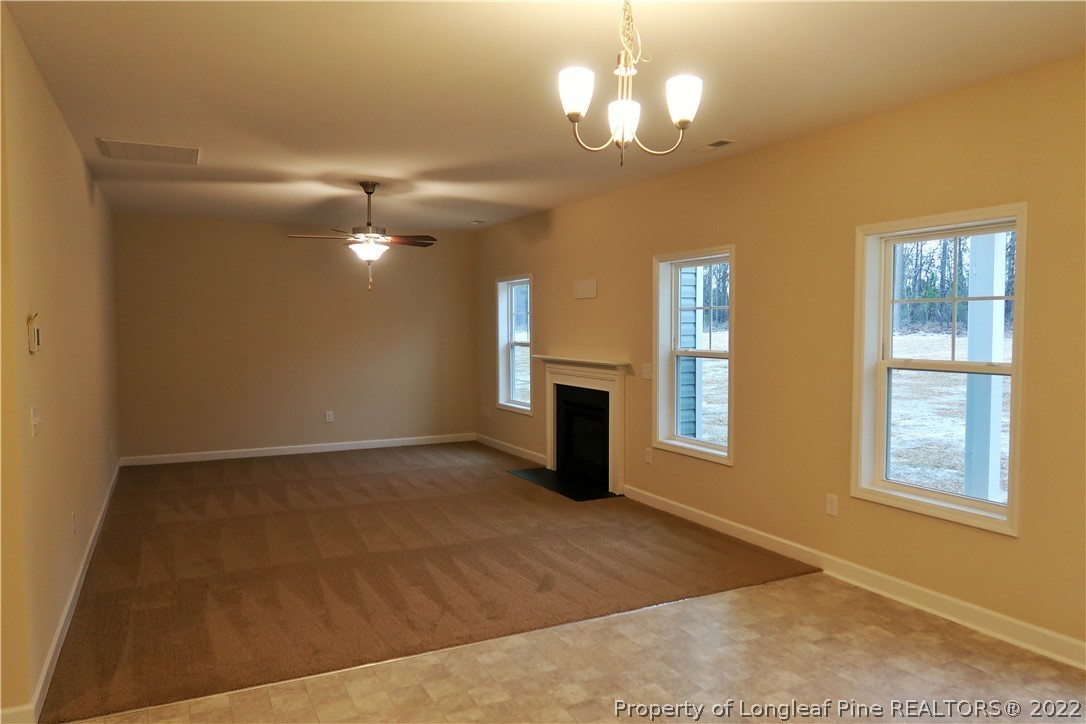 927 Montrose Road Raeford, NC 28376 - Photo 6 of 17 a view of an empty room with a window