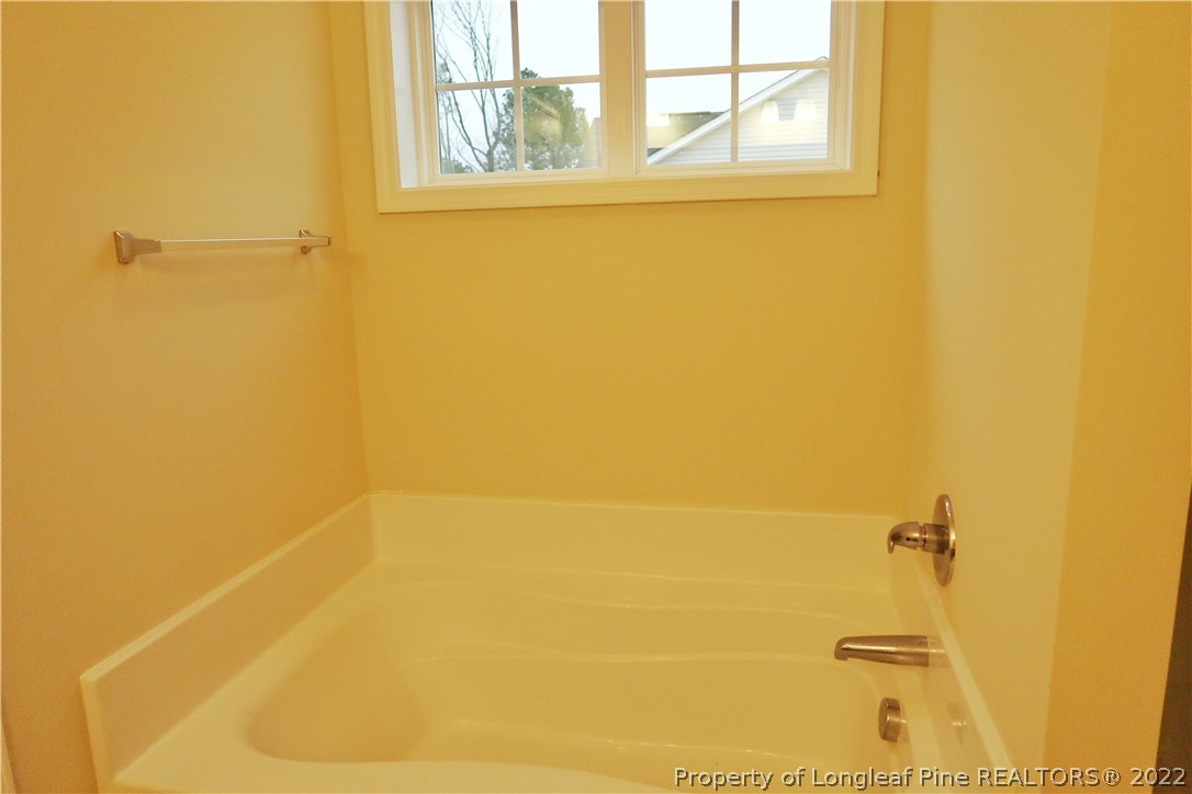 927 Montrose Road Raeford, NC 28376 - Photo 10 of 17 a bathroom with a window