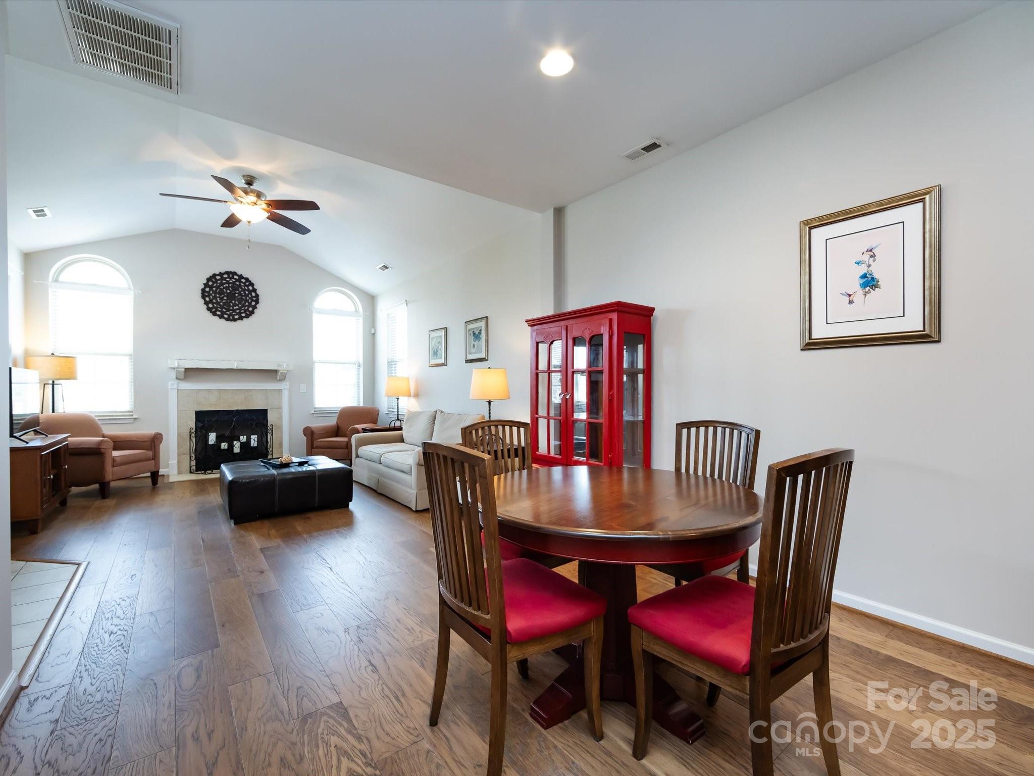 864 Ledgestone Court Fort Mill, SC 29708 - Photo 11 of 30 a living room with furniture a fireplace and a table