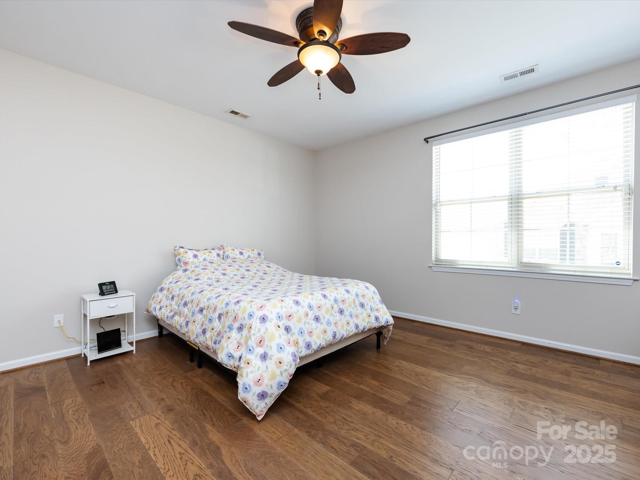 864 Ledgestone Court Fort Mill, SC 29708 - Photo 18 of 30 a bedroom with a bed and a window