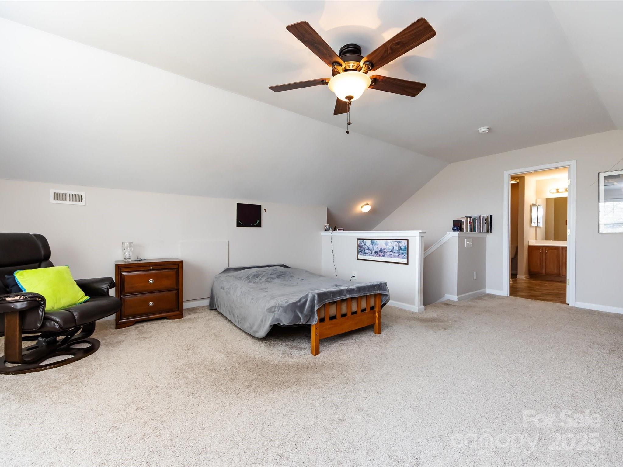 864 Ledgestone Court Fort Mill, SC 29708 - Photo 27 of 30 a living room with furniture and a flat screen tv