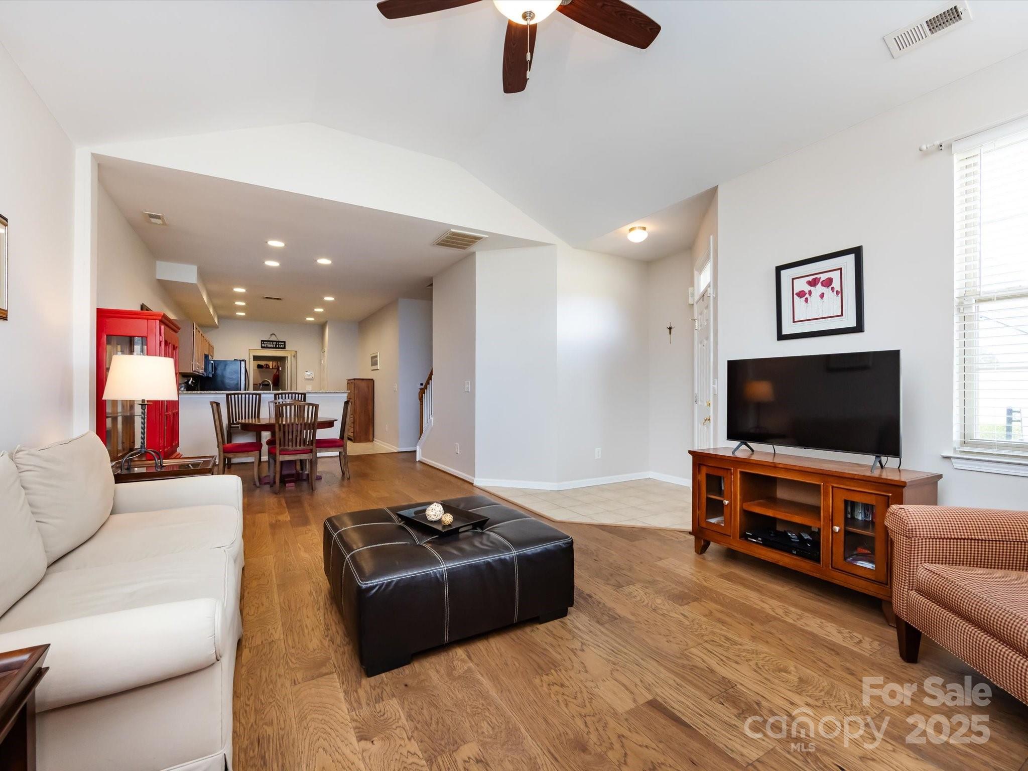 864 Ledgestone Court Fort Mill, SC 29708 - Photo 29 of 30 a living room with furniture and a flat screen tv