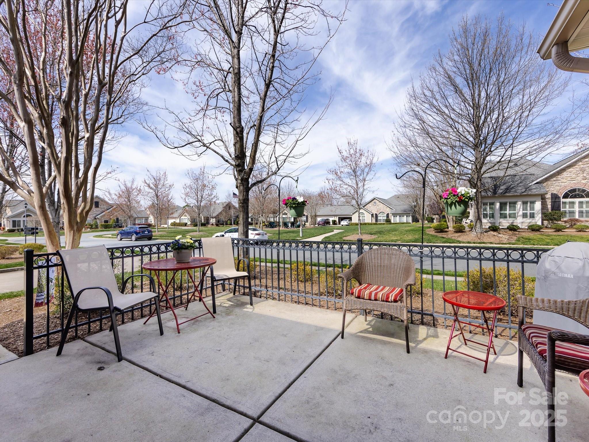 864 Ledgestone Court Fort Mill, SC 29708 - Photo 4 of 30 a view of chairs and bench on roof deck
