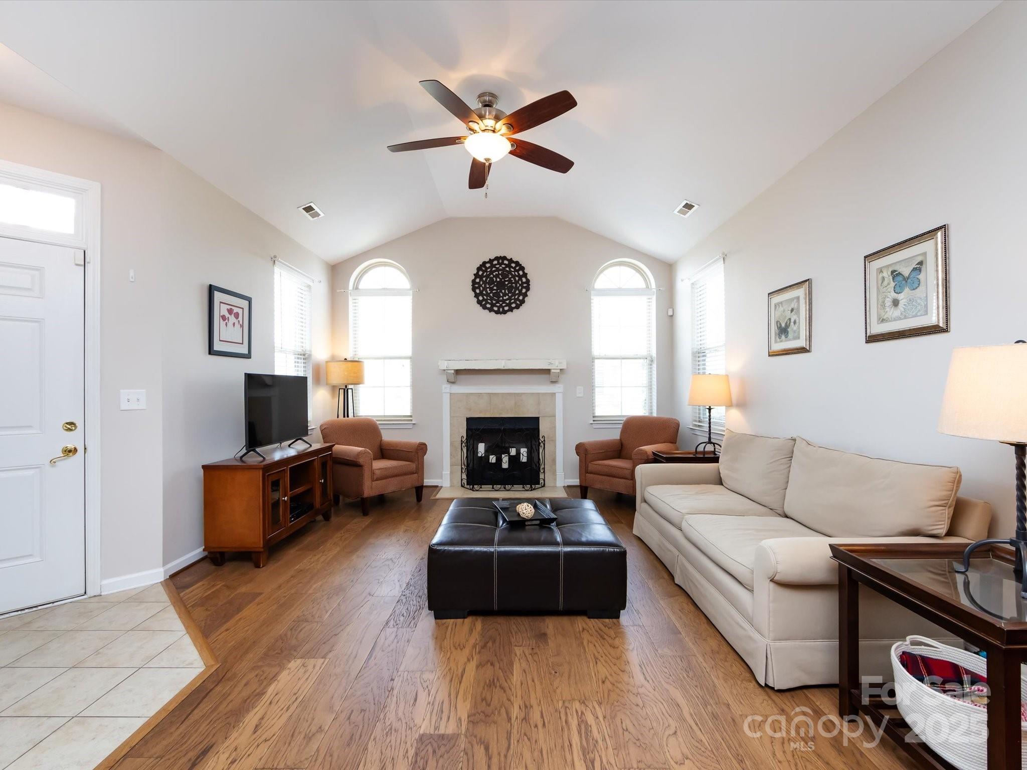 864 Ledgestone Court Fort Mill, SC 29708 - Photo 9 of 30 a living room with furniture and a fireplace