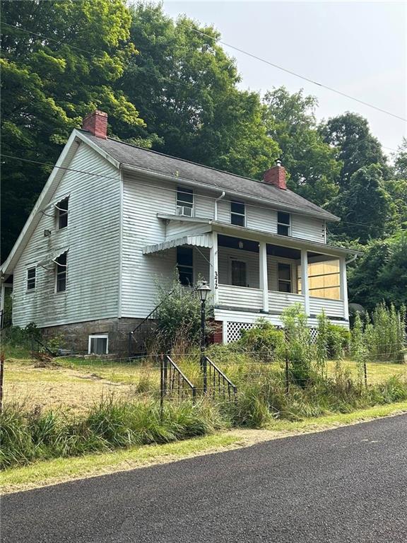 a house that has a lot of plants in it
