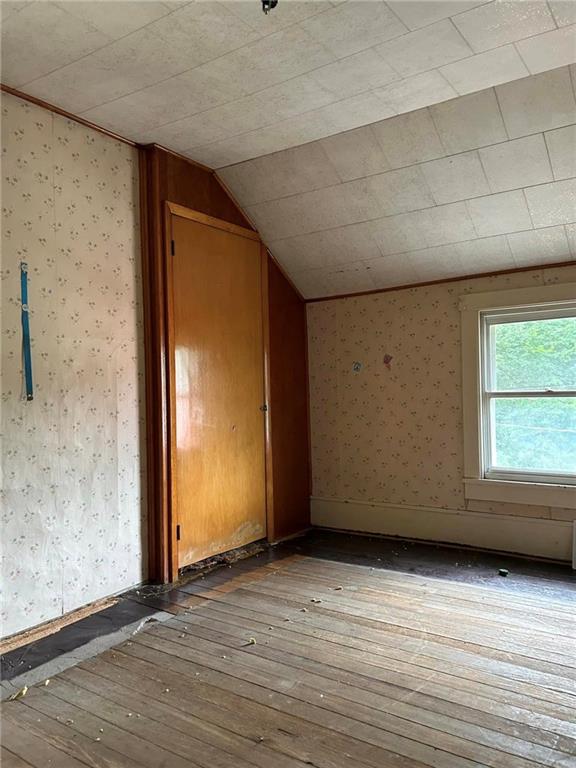 372 Center Gas Road New Salem, PA 15468 - Photo 11 of 33 an empty room with wooden floor and windows