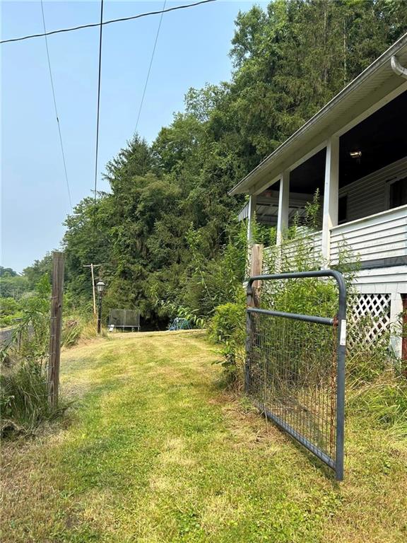 372 Center Gas Road New Salem, PA 15468 - Photo 16 of 33 a backyard of a house with lots of green space