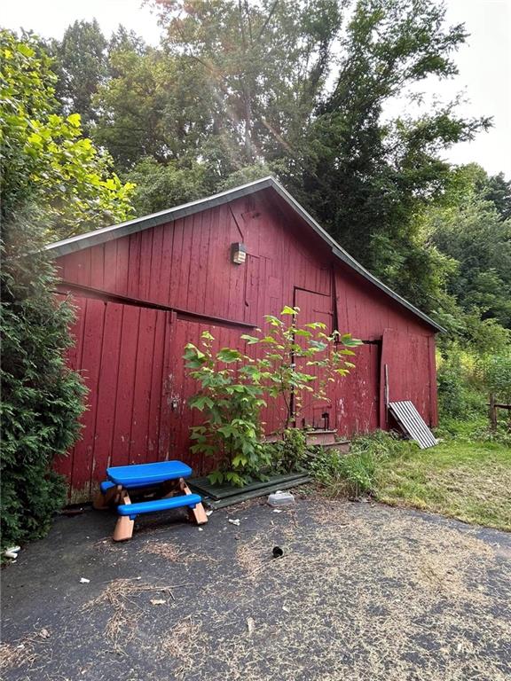 372 Center Gas Road New Salem, PA 15468 - Photo 21 of 33 a view of a small house with a yard