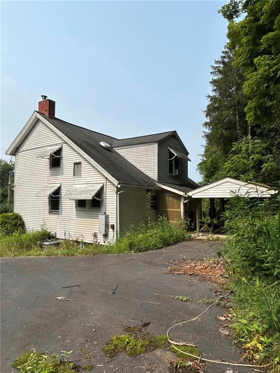 372 Center Gas Road New Salem, PA 15468 - Photo 3 of 33 a front view of a house with a yard
