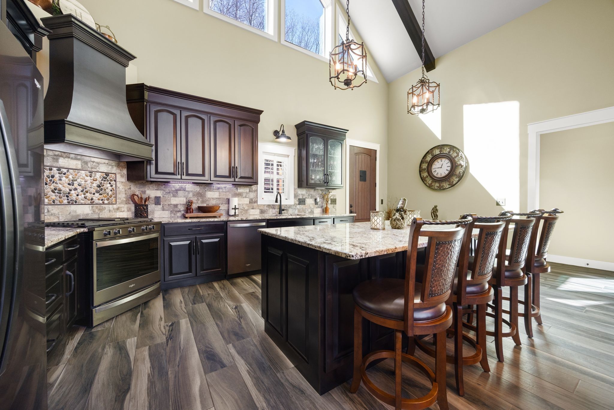 354 Mountain Farms Road Signal Mountain, TN 37377 - Photo 14 of 74 a kitchen with stainless steel appliances granite countertop a stove a sink dishwasher and cabinets with wooden floor